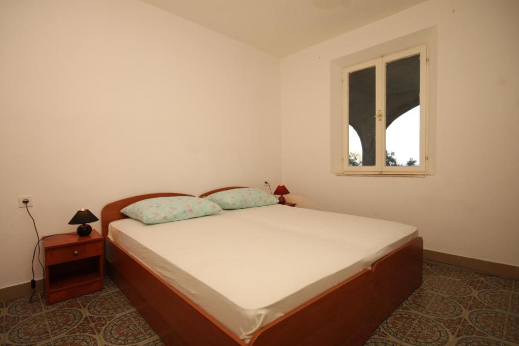 Postel nebo postele na pokoji v ubytování Apartments and rooms by the sea Lucica, Lastovo - 990
