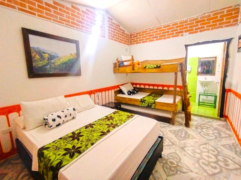 Cama o camas de una habitación en Casa Turística Art-Vélez Salento