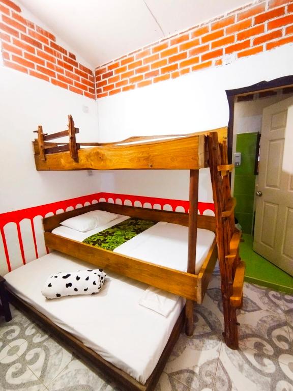Cama o camas de una habitación en Casa Turística Art-Vélez Salento