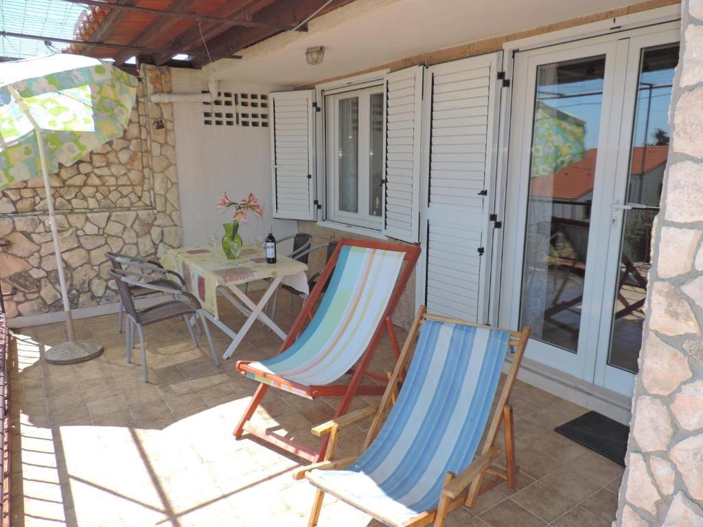 Patio nebo venkovní prostory v ubytování Apartments by the sea Seget Vranjica, Trogir - 975