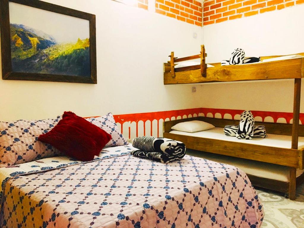 Cama o camas de una habitación en Casa Turística Art-Vélez Salento