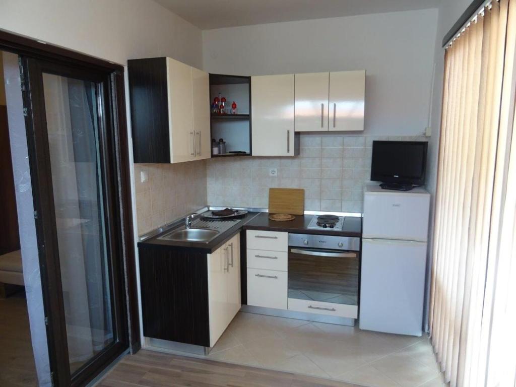 Kuchyňa alebo kuchynka v ubytovaní Apartments with parking spaces Biograd na Moru, Biograd - 860