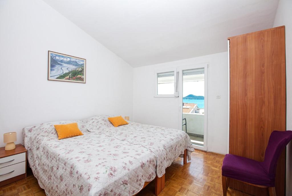 Posteľ alebo postele v izbe v ubytovaní Apartment Biograd na Moru 863b