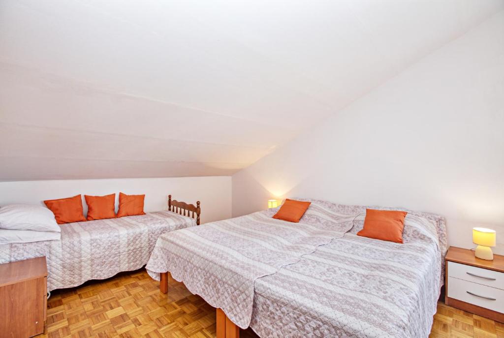 Posteľ alebo postele v izbe v ubytovaní Apartment Biograd na Moru 863b
