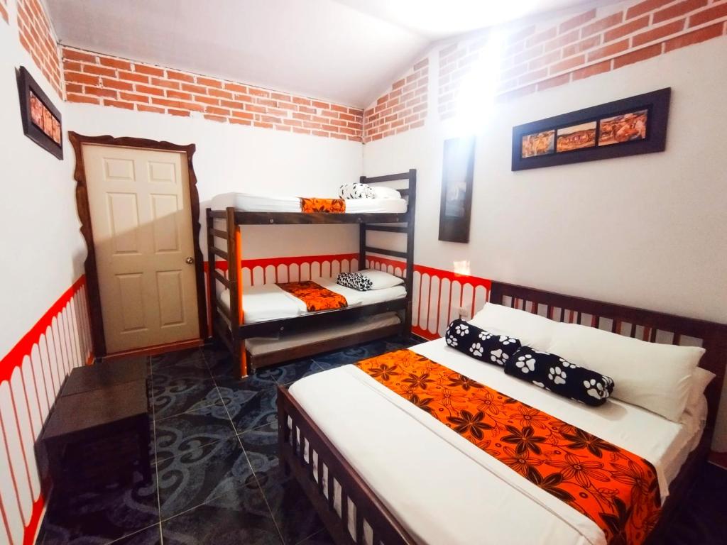 Cama o camas de una habitación en Casa Turística Art-Vélez Salento