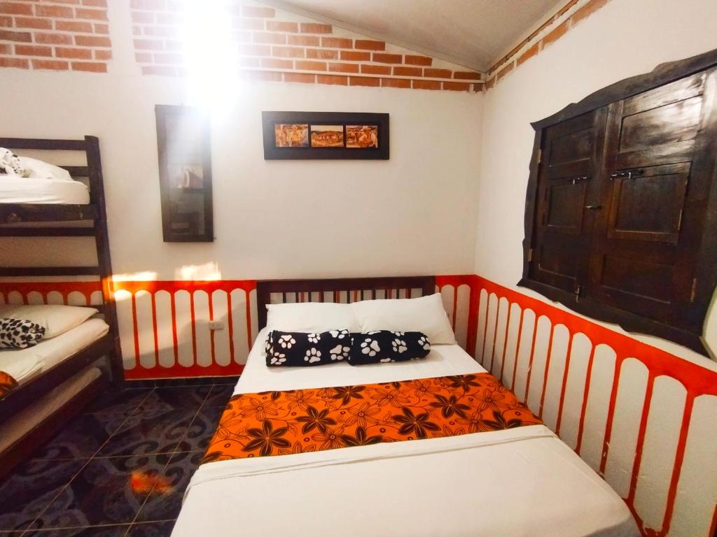 Cama o camas de una habitación en Casa Turística Art-Vélez Salento