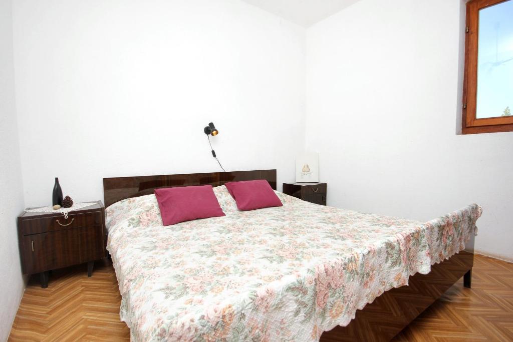 Postel nebo postele na pokoji v ubytování Apartments with WiFi Zman, Dugi otok - 887