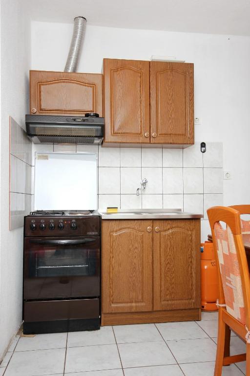 Kuchyň nebo kuchyňský kout v ubytování Apartments with WiFi Zman, Dugi otok - 887