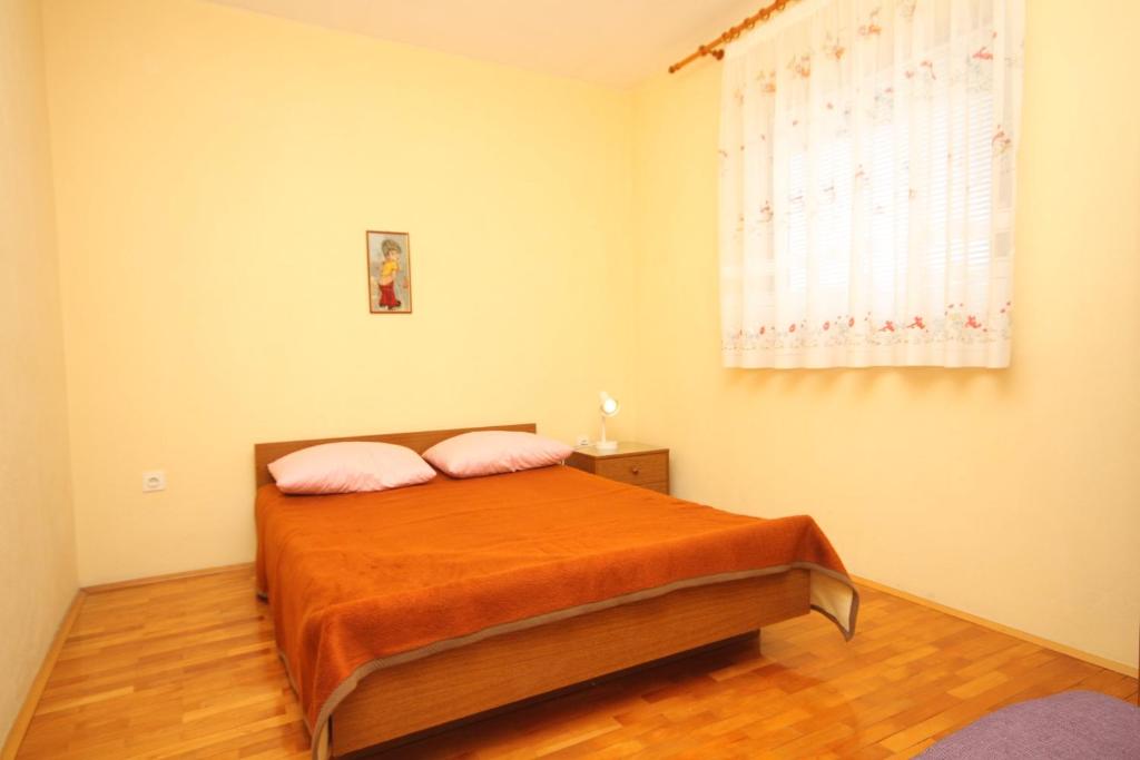 Posteľ alebo postele v izbe v ubytovaní Apartments with a parking space Sali, Dugi otok - 872