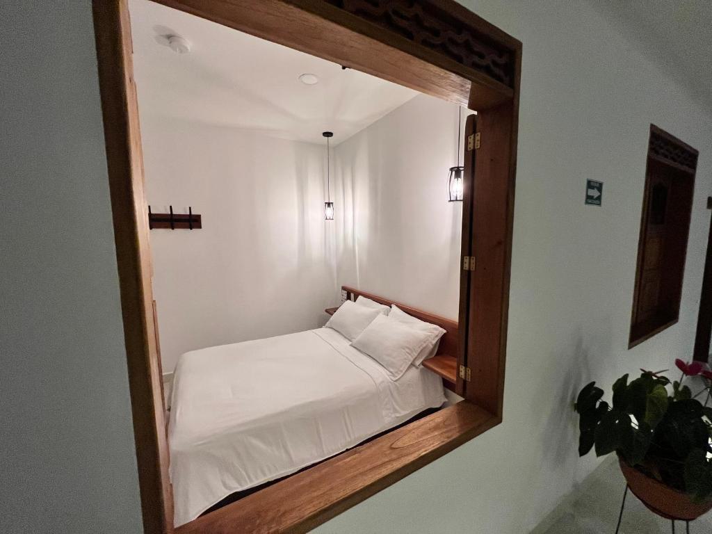 Postel nebo postele na pokoji v ubytování Casa Isabel Hotel