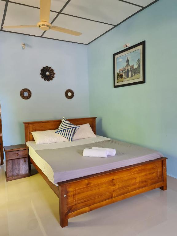 Postel nebo postele na pokoji v ubytování Nalluran illam - family room