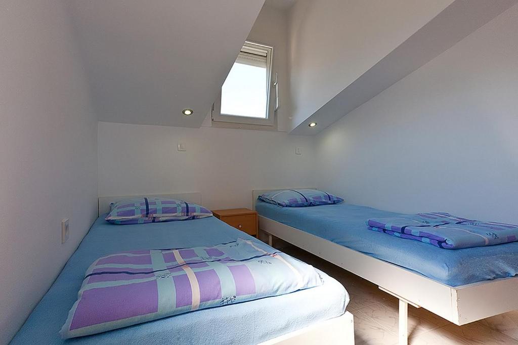 Fotografie z fotogalerie ubytování Apartments by the sea Rogoznica - 18746 v Rogoznici