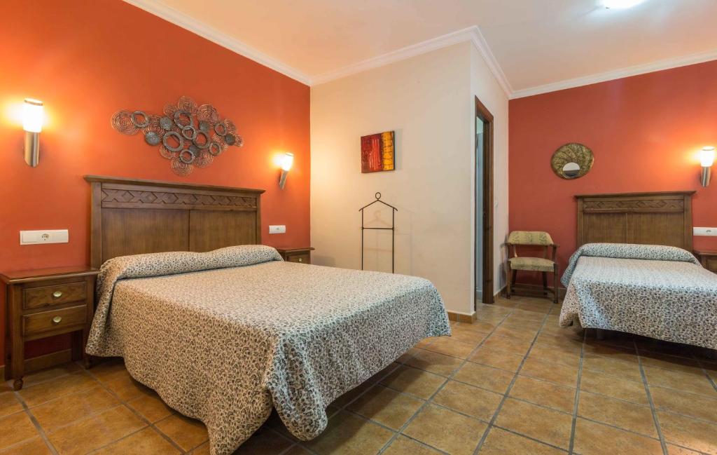 Postel nebo postele na pokoji v ubytování Hostal Costa Luz