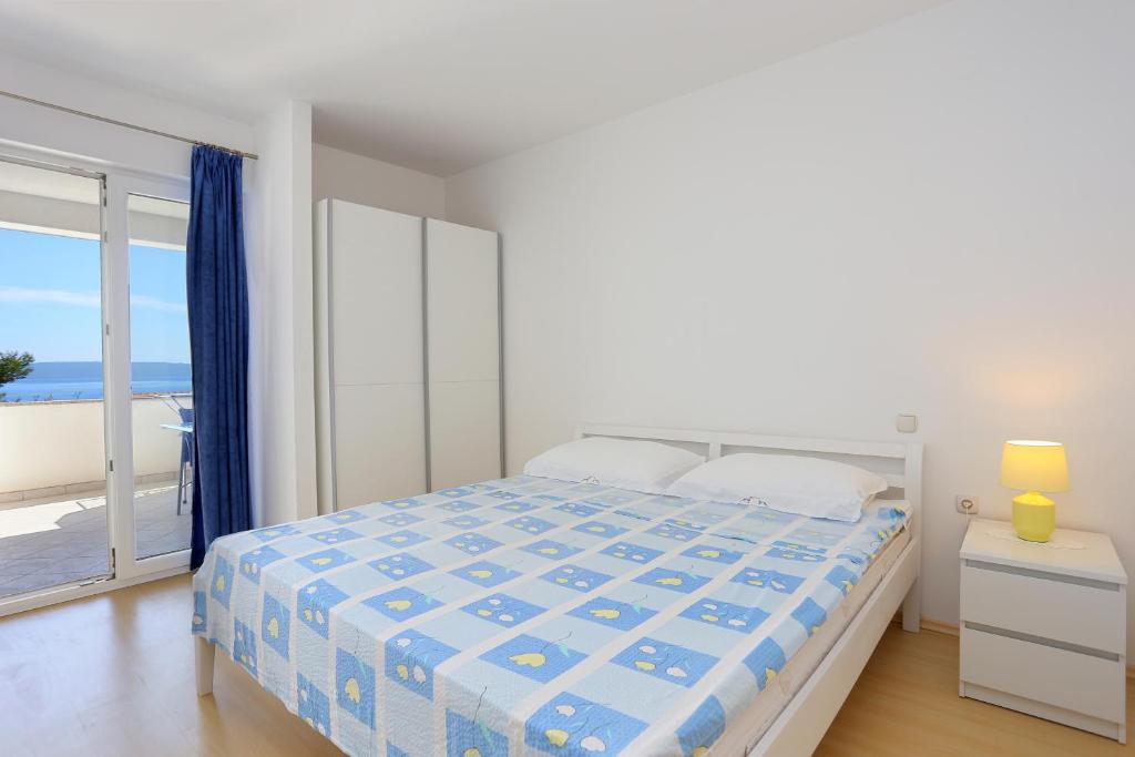 Posteľ alebo postele v izbe v ubytovaní Apartments with a parking space Businci, Ciovo - 18800