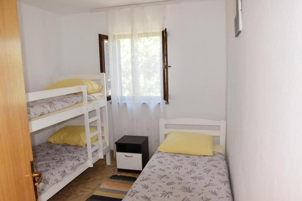 Postel nebo postele na pokoji v ubytování Apartments with a parking space Vrsi - Mulo, Zadar - 18849