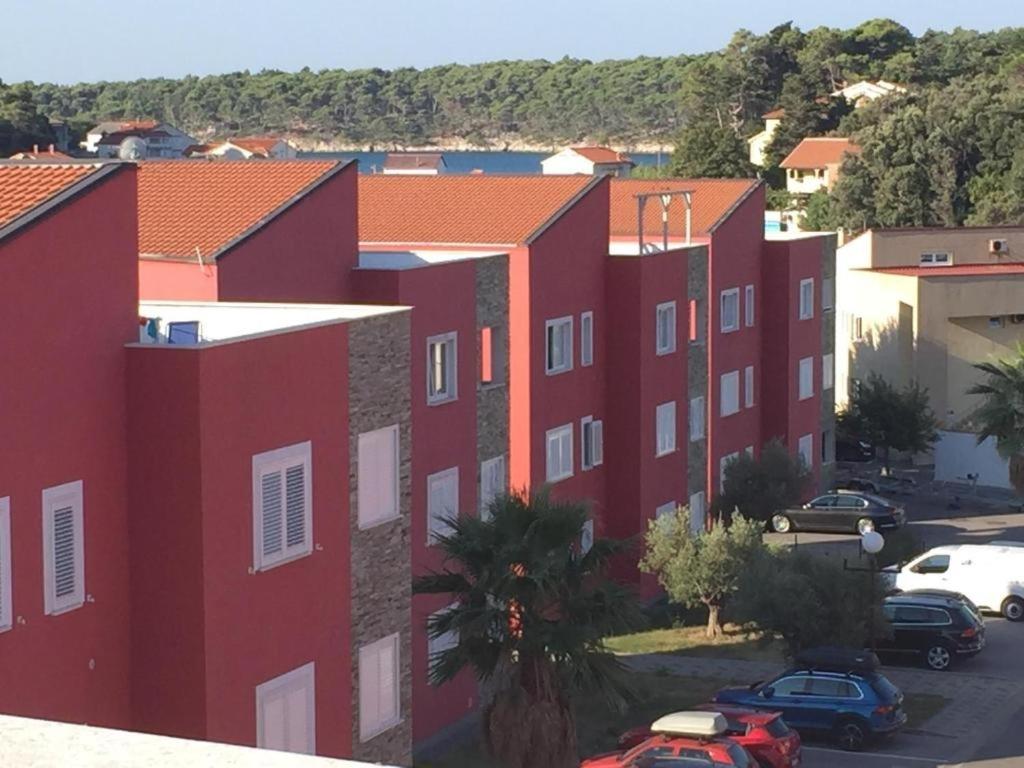 Apartments with parking space Palit, Rab - 18900