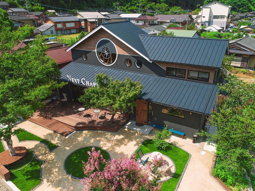 an overhead view of a home with a church at Next Chapter - Guesthouse - Kito in Uinouchi