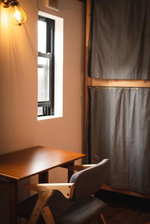 Posezení v ubytování Next Chapter - Guesthouse - Kito