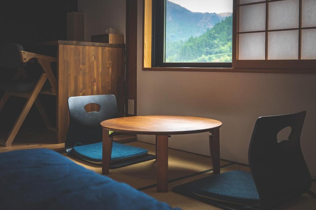 Posezení v ubytování Next Chapter - Guesthouse - Kito