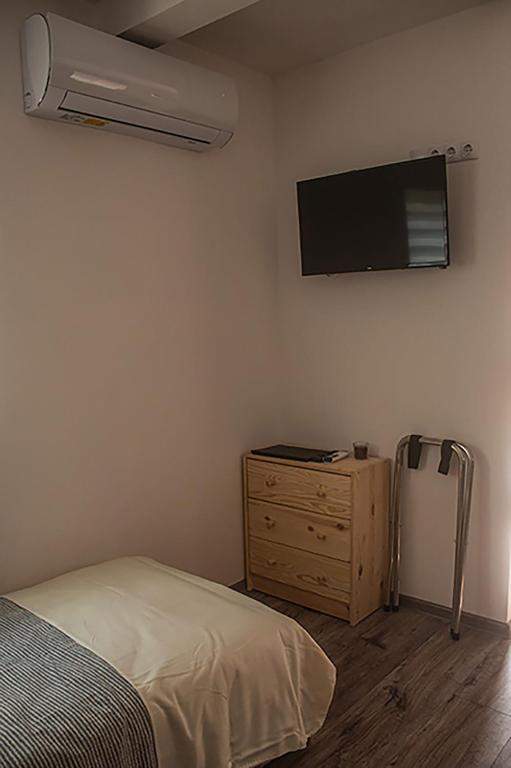Posteľ alebo postele v izbe v ubytovaní SárvárLAK Apartmanház