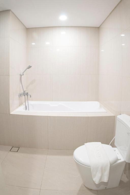 Koupelna v ubytování Grand Picasso Hotel