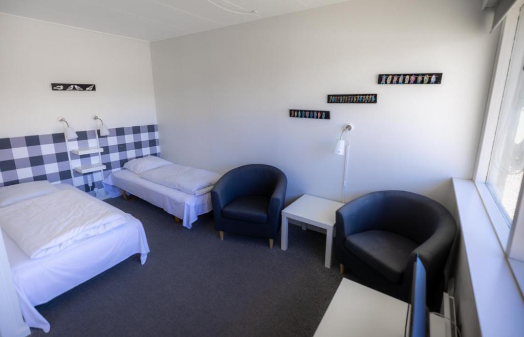 Postel nebo postele na pokoji v ubytování Tylstrup Kro og Motel