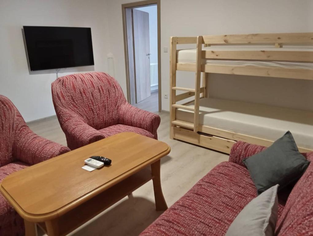 Postel nebo postele na pokoji v ubytování V centru