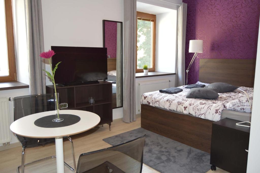 Postel nebo postele na pokoji v ubytování Atrium Apartments