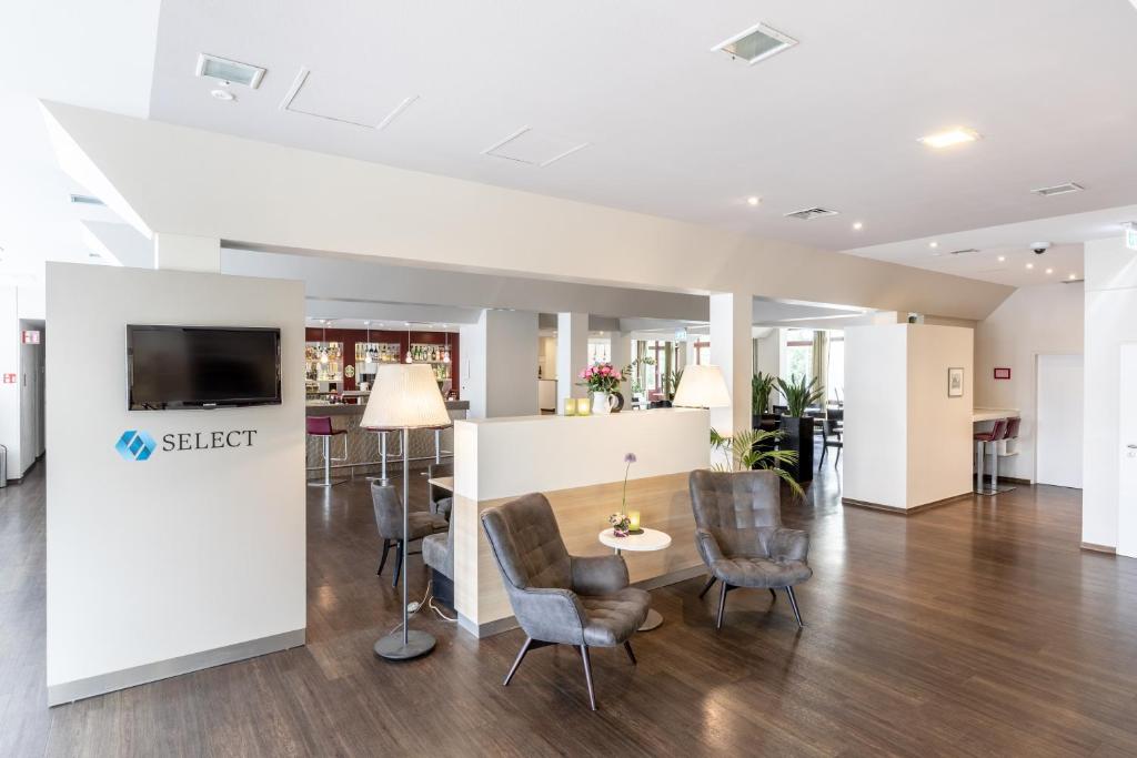 TV a/nebo společenská místnost v ubytování Select Hotel Osnabrueck