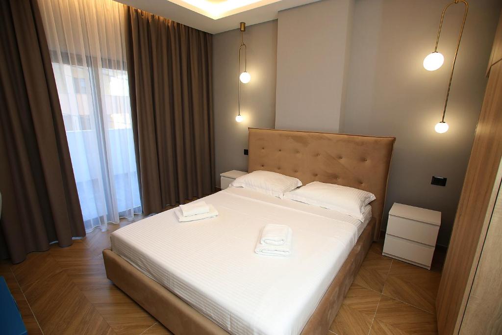 Postel nebo postele na pokoji v ubytování Diamond Hotel