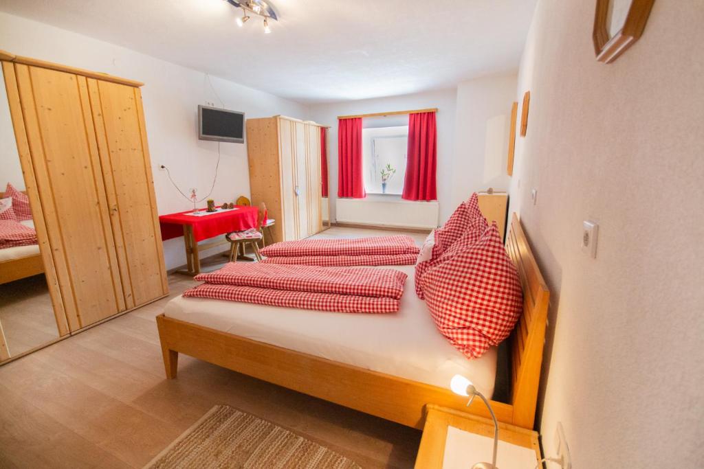 Postel nebo postele na pokoji v ubytování Penznhof