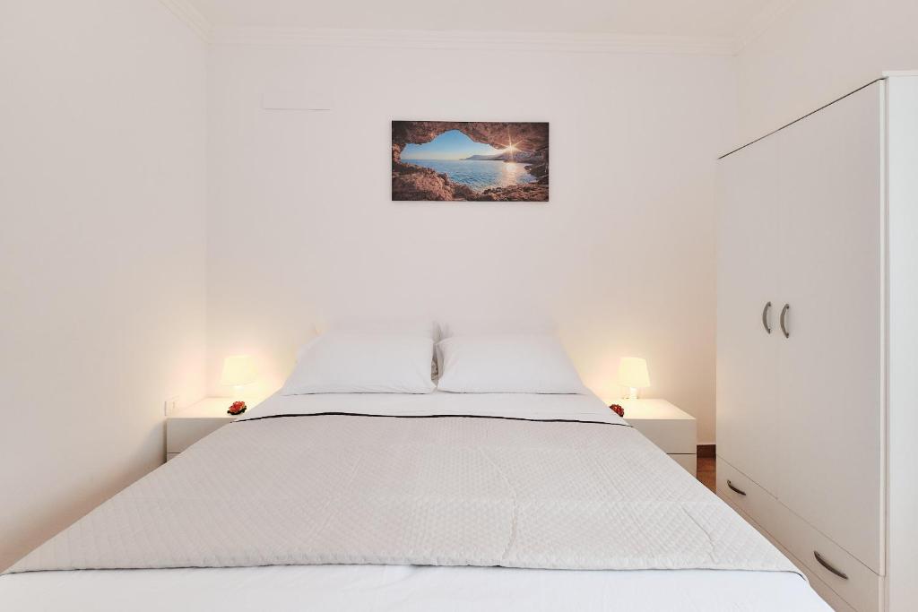Postel nebo postele na pokoji v ubytování Casa Mazzini