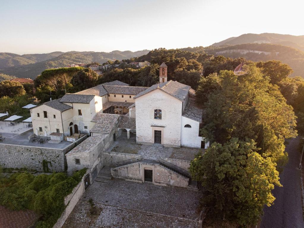 an aerial view of a large white house at Convento dei Cappuccini in Tolfa