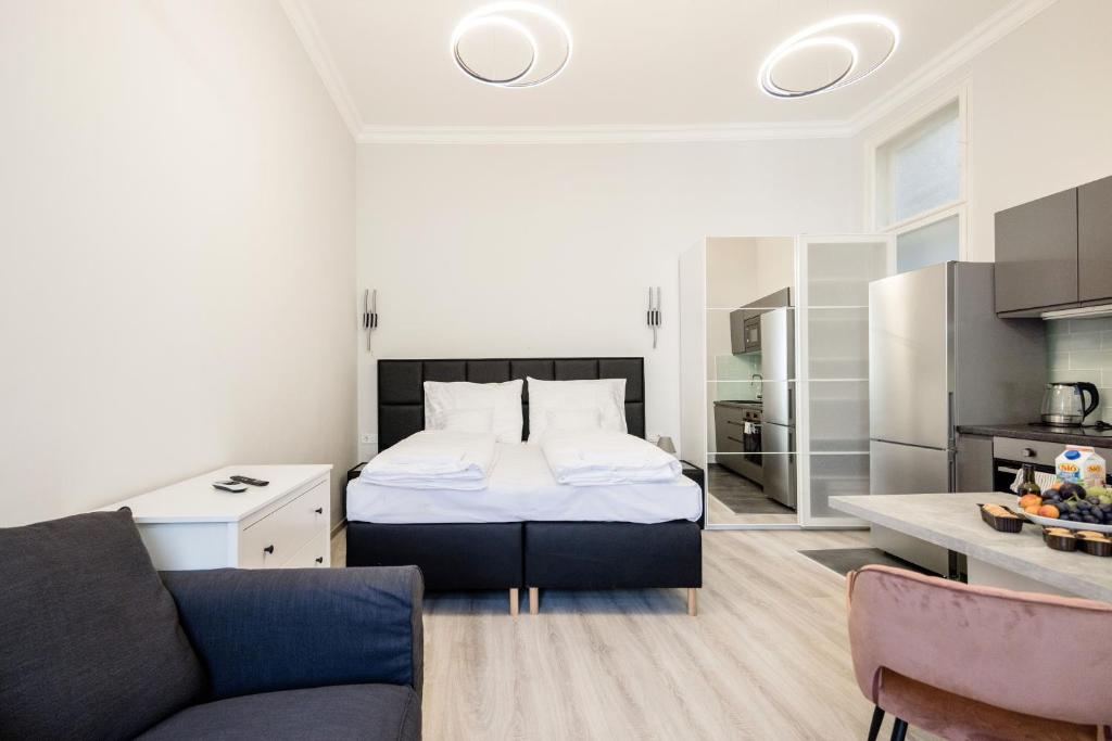 מיטה או מיטות בחדר ב-Prime Star Fashion street modern luxury apartments