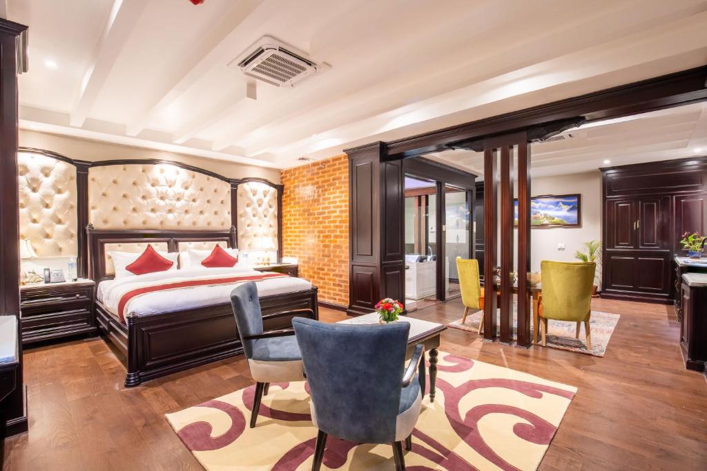 Postel nebo postele na pokoji v ubytování Hotel Pabera Heritage Boutique