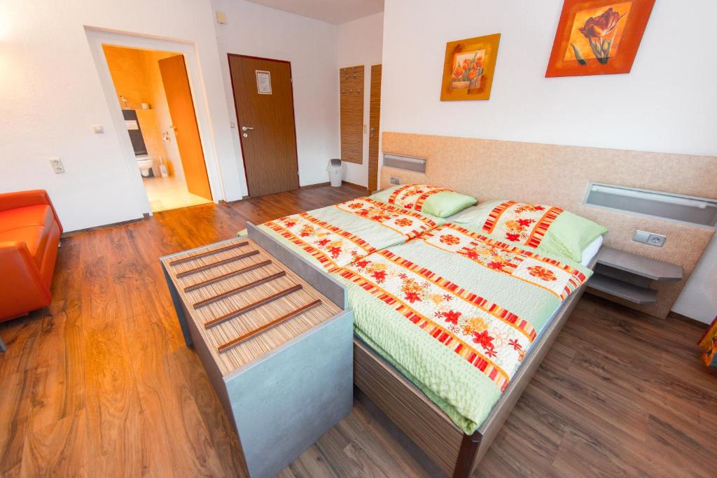 Postel nebo postele na pokoji v ubytování Pension La Mamma