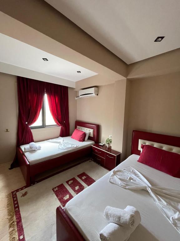 Postel nebo postele na pokoji v ubytování Hotel Selfo