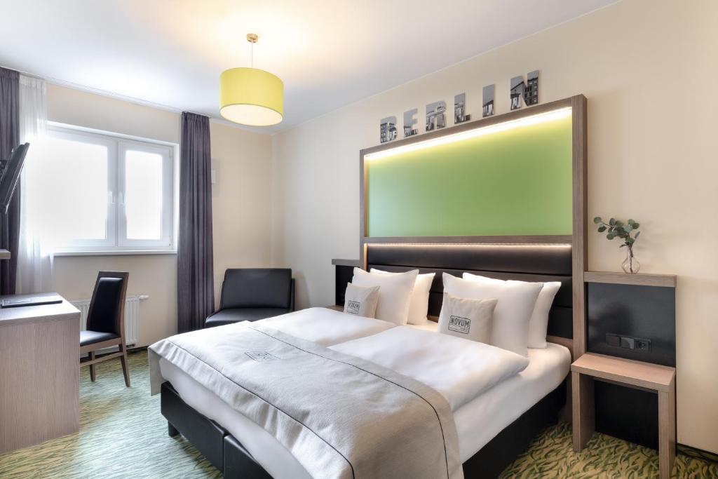 Postel nebo postele na pokoji v ubytování Hotel Aldea Berlin