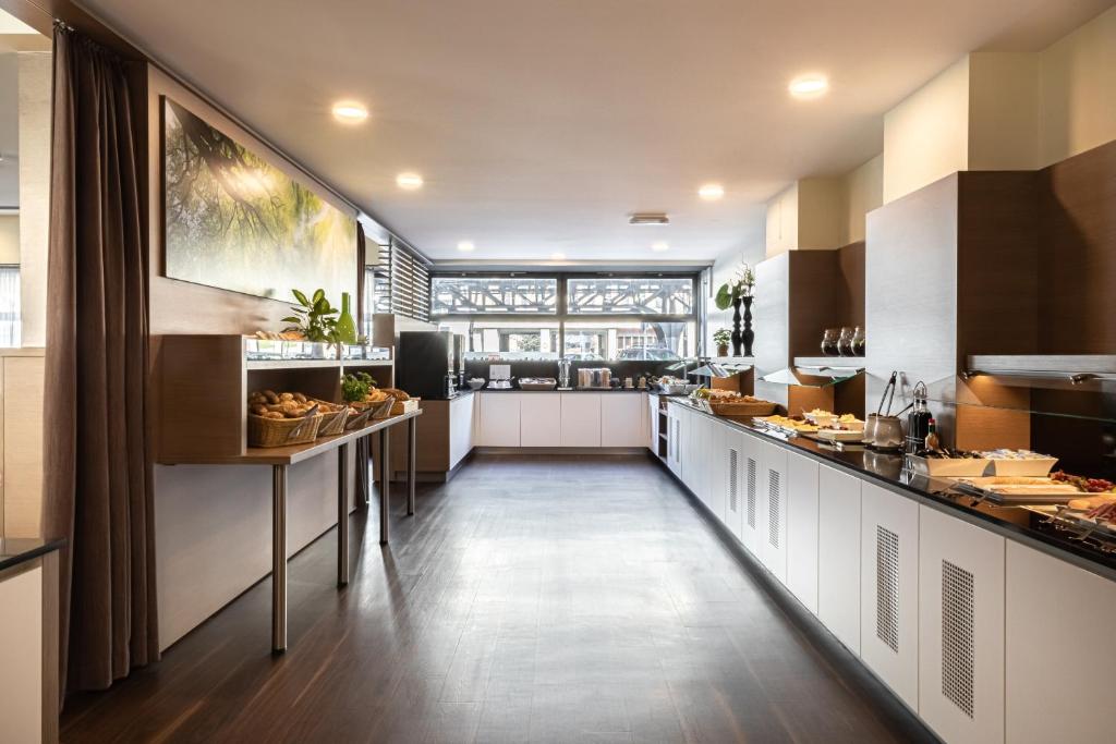 Kuchyň nebo kuchyňský kout v ubytování Hotel Aldea Berlin