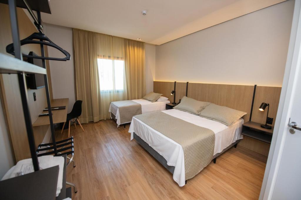 Origens Hotel - Deluxe Dreibettzimmer