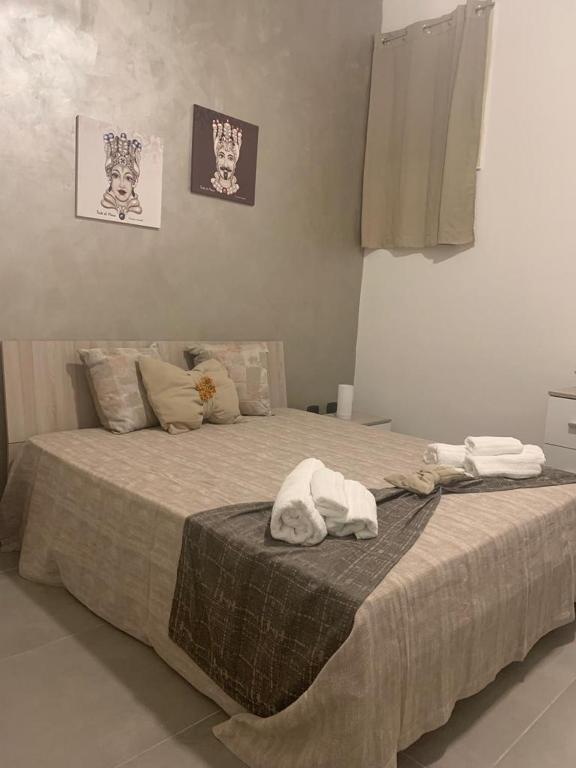 Posteľ alebo postele v izbe v ubytovaní La Pietra di Giada
