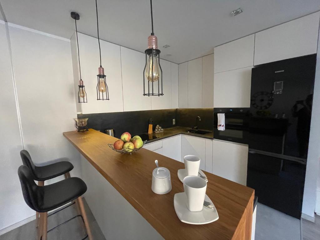 Kuchyň nebo kuchyňský kout v ubytování Apartament Centrum Bodzentyńska, centrum Rynek, bezpłatny parking