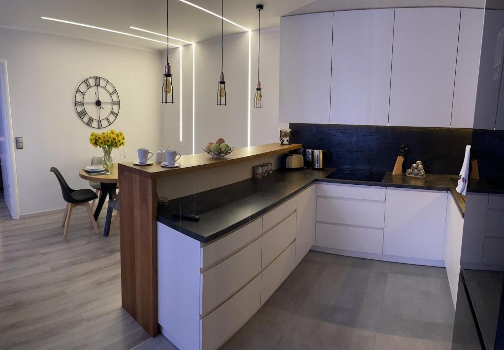 Kuchyň nebo kuchyňský kout v ubytování Apartament Centrum Bodzentyńska, centrum Rynek, bezpłatny parking