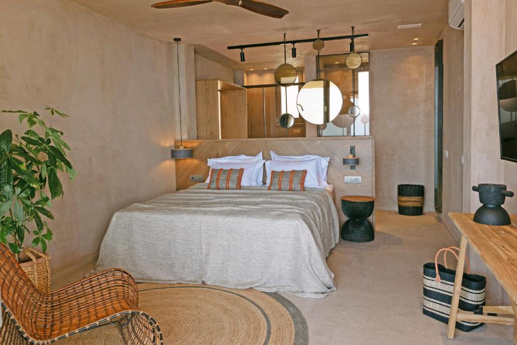 Postel nebo postele na pokoji v ubytování Altera cave villas