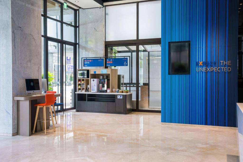 TV a/nebo společenská místnost v ubytování Holiday Inn Express Kaohsiung Love River by IHG