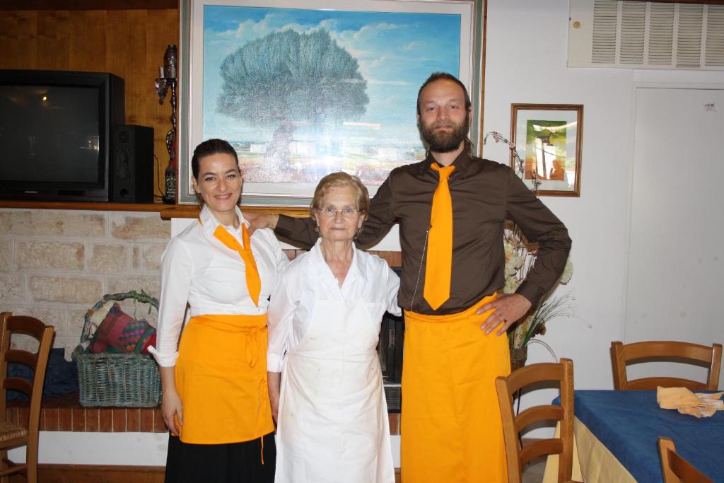 Členové personálu v ubytování Hotel Donatello
