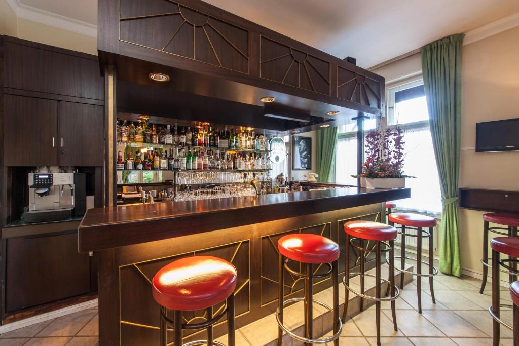 TV a/nebo společenská místnost v ubytování Hotel Kronprinz Berlin