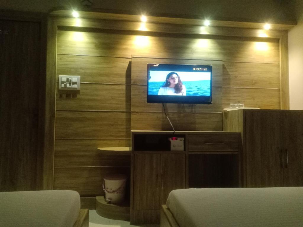 TV a/nebo společenská místnost v ubytování HN Palace Homestay