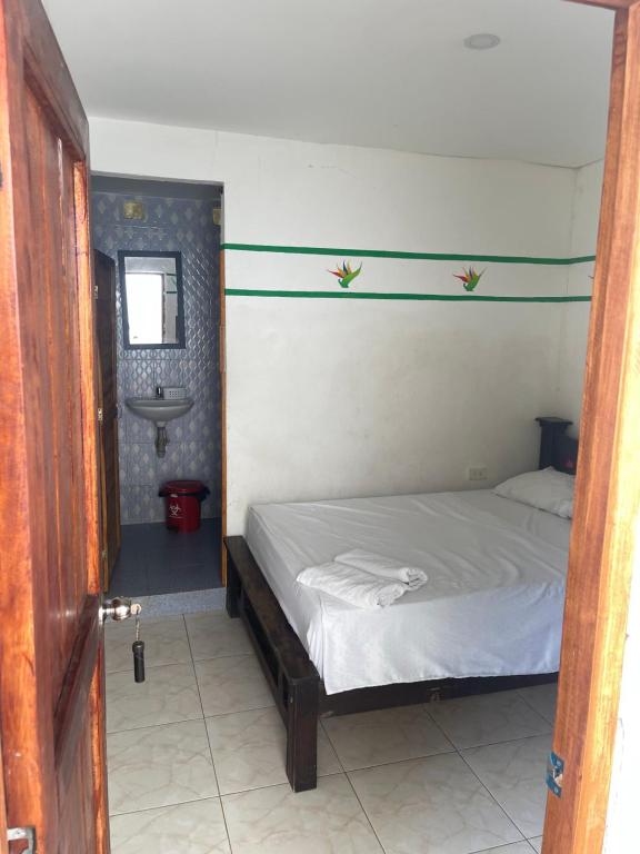 Postel nebo postele na pokoji v ubytování Palomino Hostel