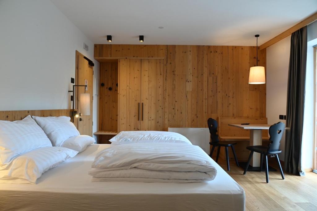 Postel nebo postele na pokoji v ubytování B&B Fontanella